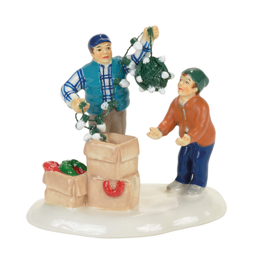Clark unpacks boxes of lights for Rusty to untangle.