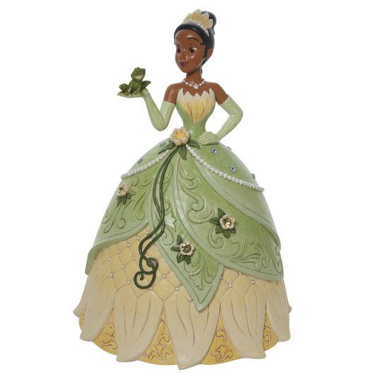 In a spectacular floral dress and tiara, Tiana holds her soon to be prince, the frog.